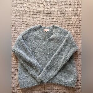 Woman’s Grey Fluffy Turtleneck Sweater